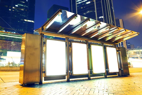 Bus station billboard at modern city street — Stock Photo, Image