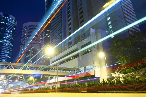 Traffic light trails at modern city street