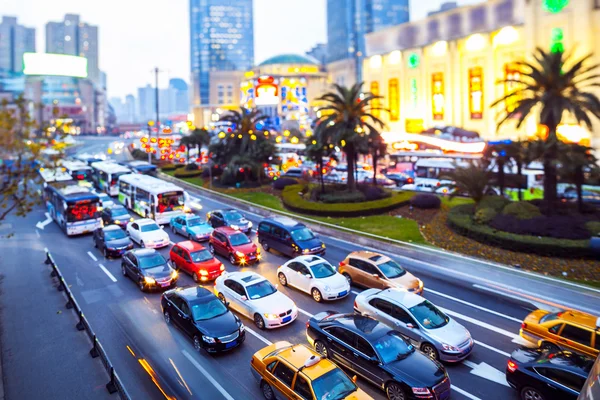 Skyline and busy traffic trails in city Stock Photo