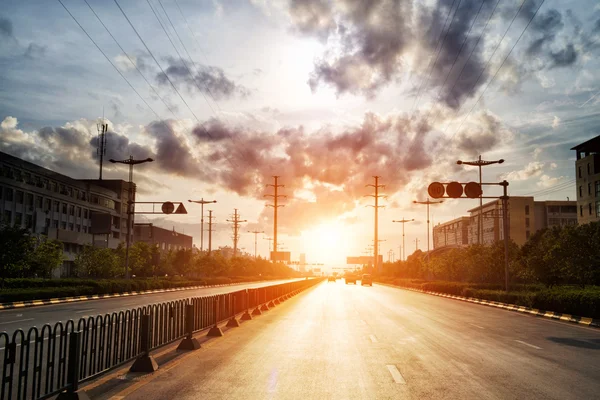 Panorama, silniční a stavební při západu slunce — Stock fotografie