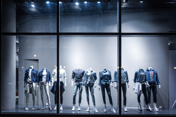 Fashion shop display window and clothes