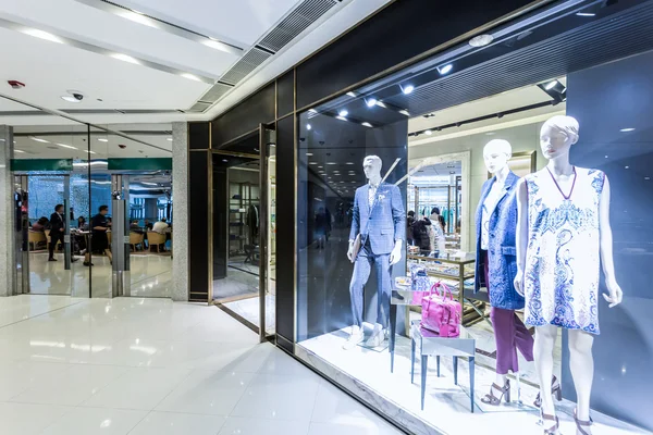 Fashion shop display window and clothes — Stock Photo, Image