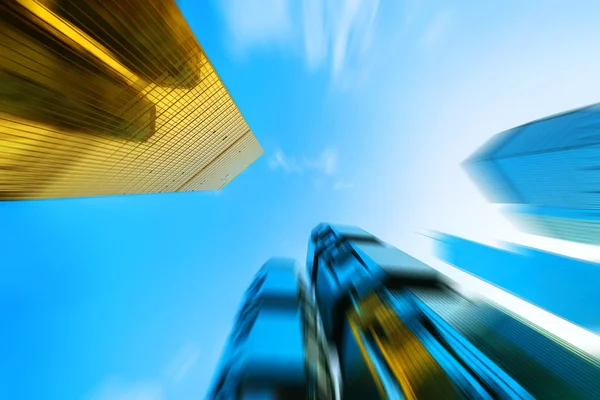 Modern skyscraper in blur motion — Stock Photo, Image