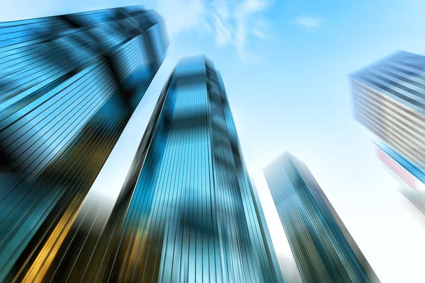 Skyscrapers in blurred motion. — Stock Photo, Image