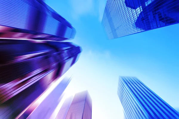 Skyscrapers in blurred motion. — Stock Photo, Image