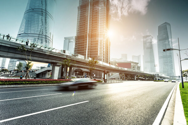 urban road and modern city skyline 