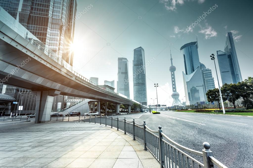 urban road and modern city skyline 