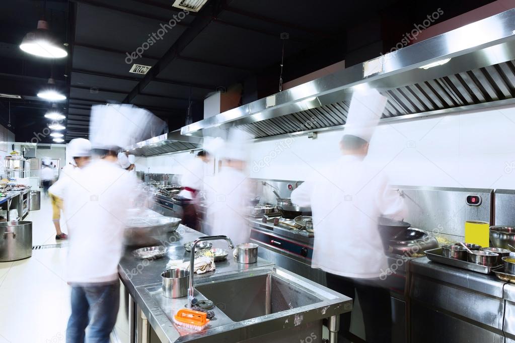 modern kitchen and busy chefs 