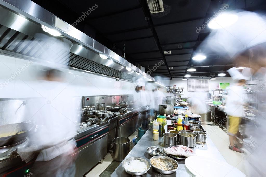 Modern kitchen and busy chefs — Stock Photo © zhudifeng #71619731