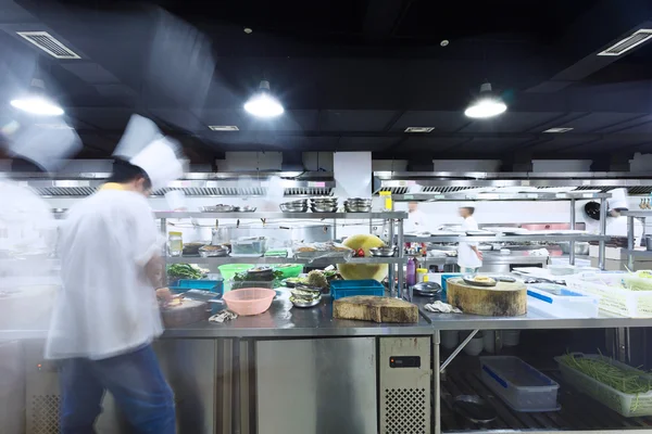 modern kitchen and busy chefs