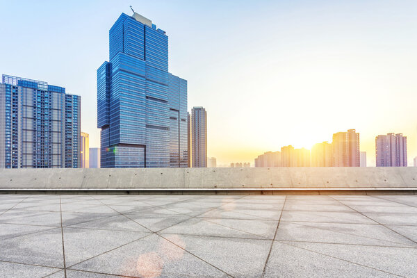 Empty floor and modern building with sunbeam
