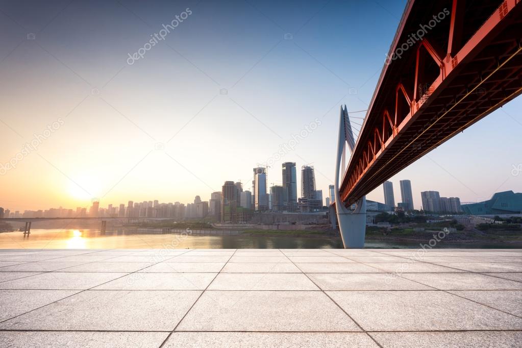 Skyline,river and bridge during sunset