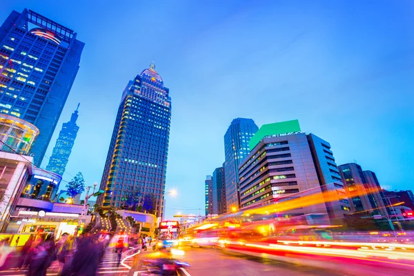 Traffic light trails in modern street — Stock Photo, Image