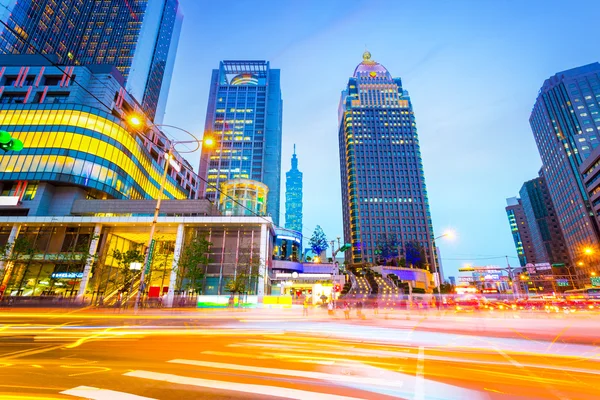 Traffic light trails in modern street — Stock Photo, Image