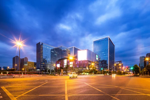 Light trails in modern city street — Stock Photo, Image