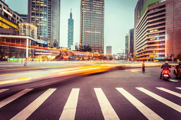 Light trails in modern city street — Stock Photo, Image