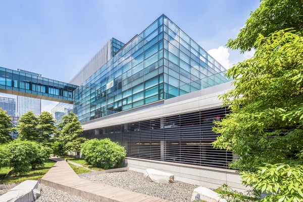 modern building and green footpath