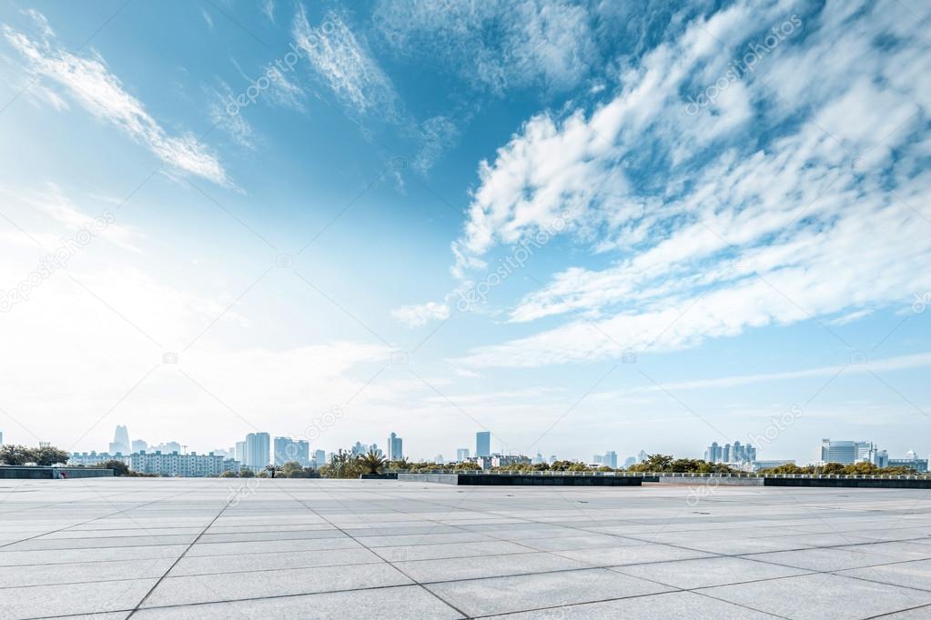 Empty square and floor with sky