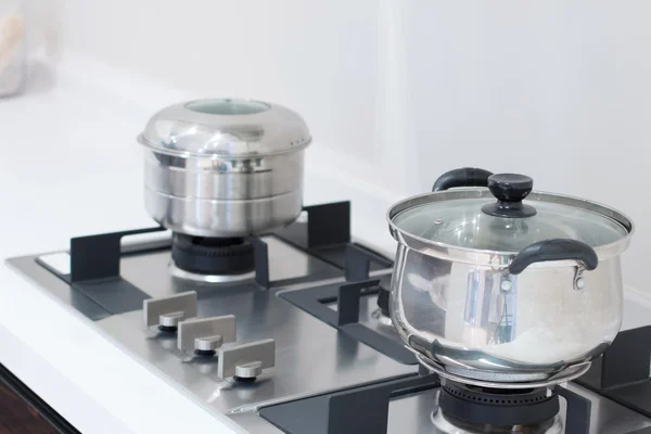 Pots on stove — Stock Photo, Image