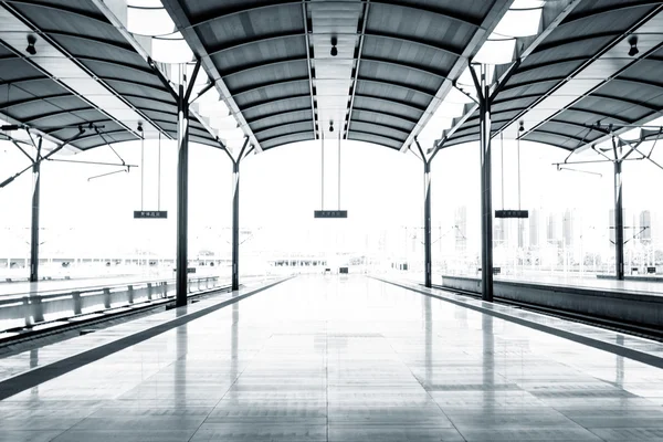 Empty floor of train station platform