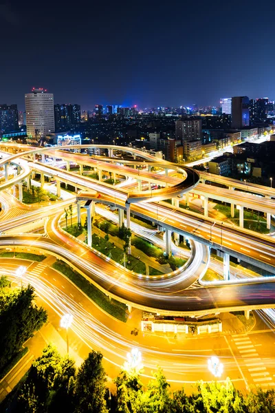 Skyline and elevated roads — Stock Photo, Image