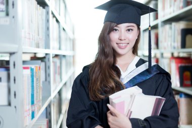asian female student holding books clipart