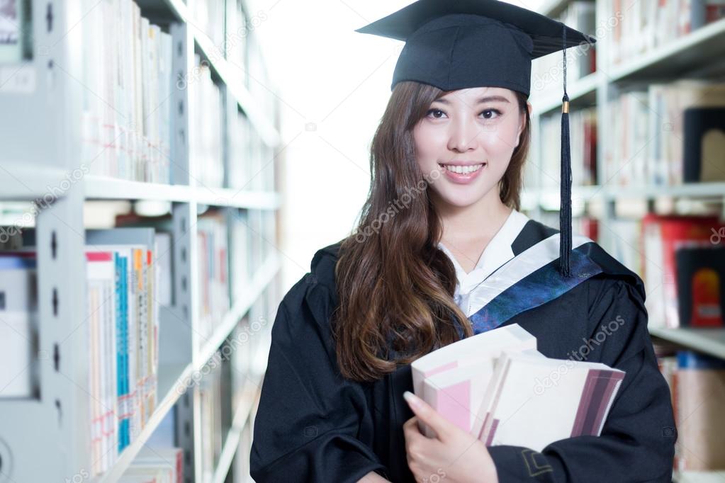 asian female student holding books