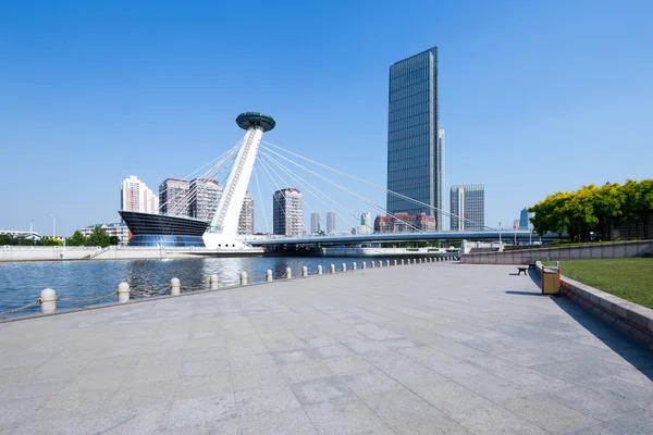 Modern city skyline with empty road floor — Stock Photo, Image