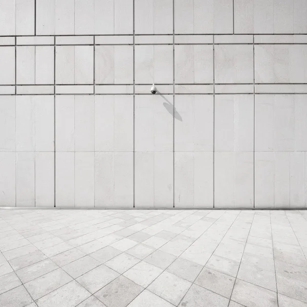 Parede de concreto e piso com cctv — Fotografia de Stock