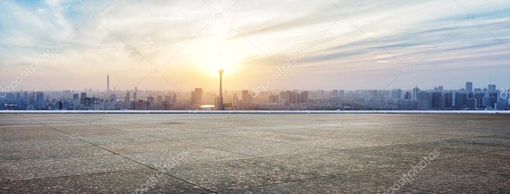 Panoramic skyline and buildings with empty square floor