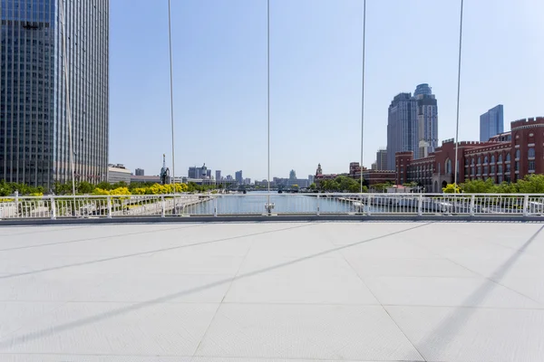 Modern bridge and empty road floor — Stock Photo, Image