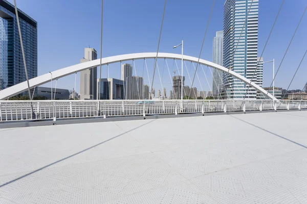 Modern bridge and empty road floor — Stock Photo, Image