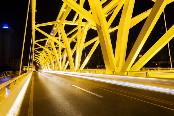 Traffic light trails on bridge — Stock Photo, Image