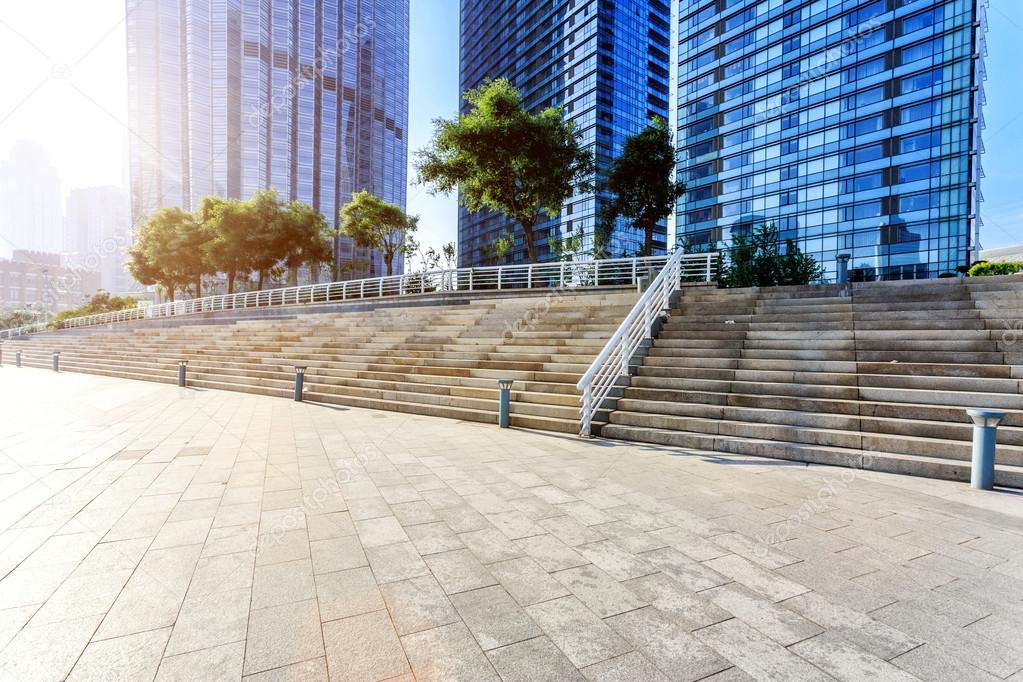 Modern skyline and empty road floor