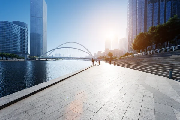 Modern skyline and empty road floor — Stock Photo, Image