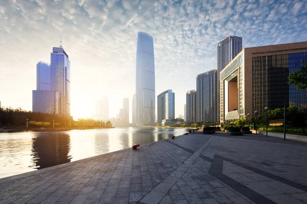 Modern skyline and empty road floor — Stock Photo, Image