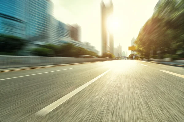 Blurred urban road — Stock Photo, Image