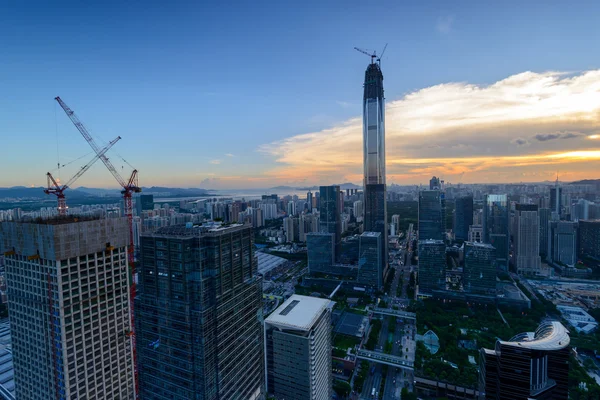 Urban cityscape at sunset — Stock Photo, Image