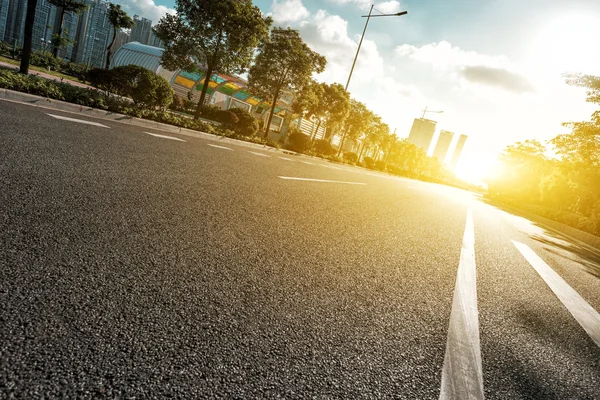 Empty asphalt road under sunshine — Stock Photo, Image