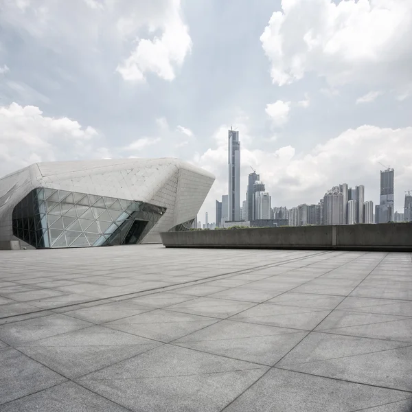 modern museum, square and skyscrapers