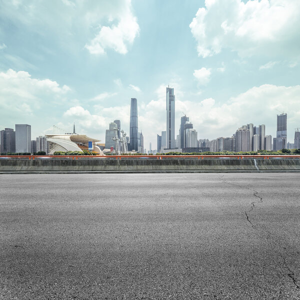 elevated highway and skyscrapers under sunbeam