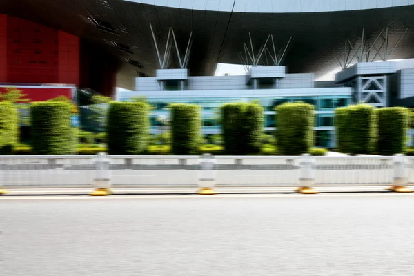 asphalt road outside a museum