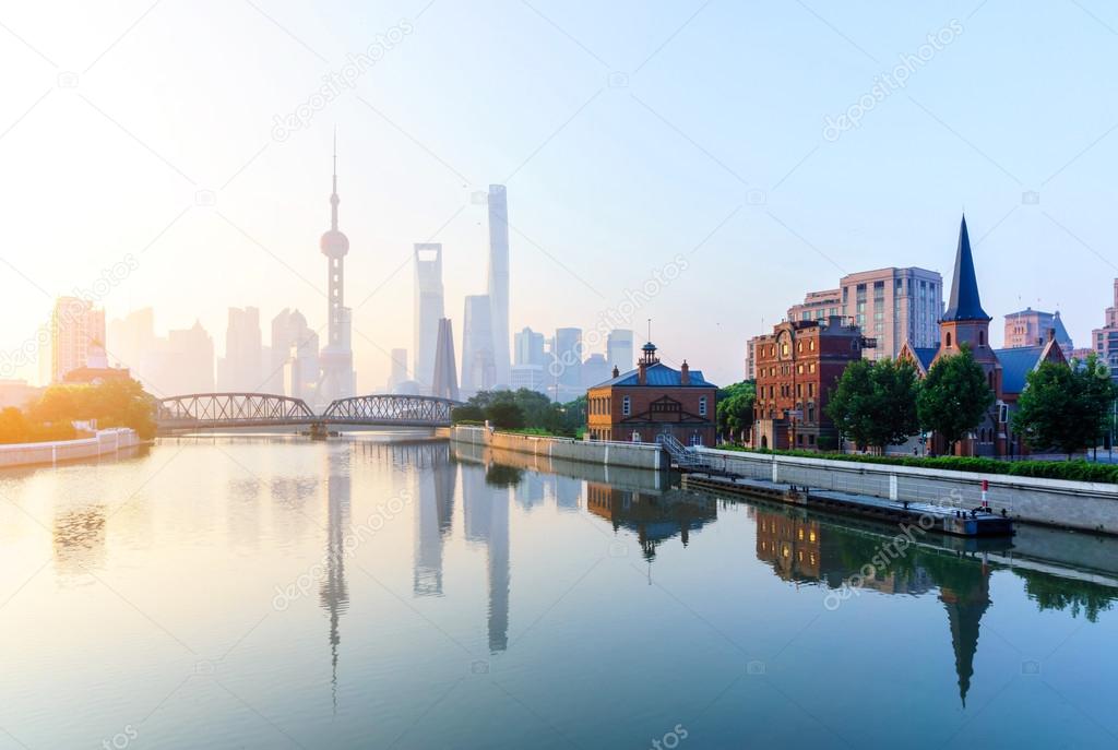 landmarks and a bridge of shanghai on the shore