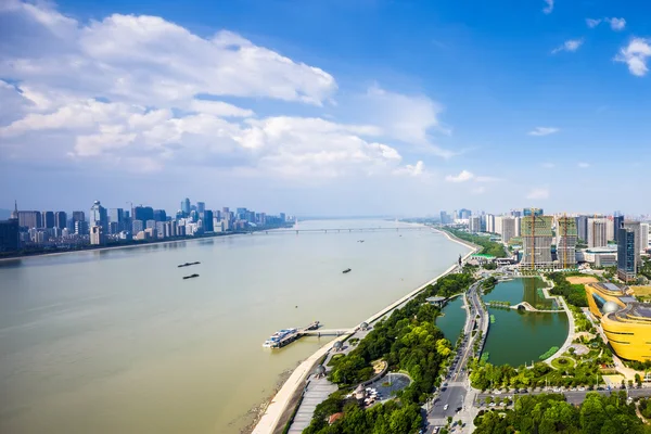 Panorama of skyscrapers and a river — Stock Photo, Image