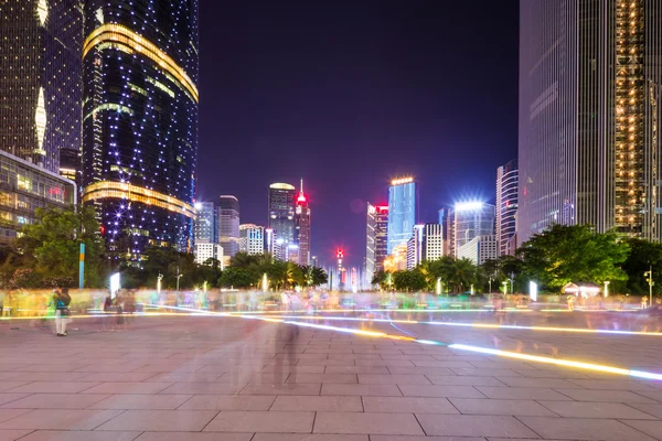Modern square and skyscrapers at night — Stock Photo, Image