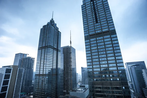 Skyscrapers and mansions of a modern city — Stock Photo, Image