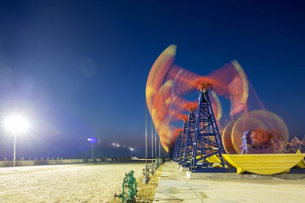 Oil-rig of oilfield day and night — Stock Photo, Image