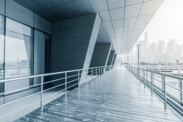 Empty wooden road around buildings — Stock Photo, Image