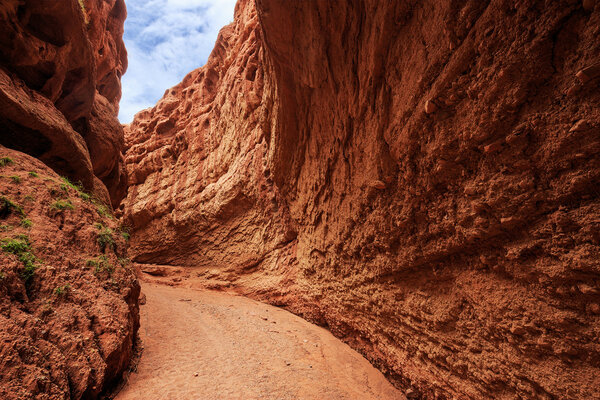 road in valley of red sandstone