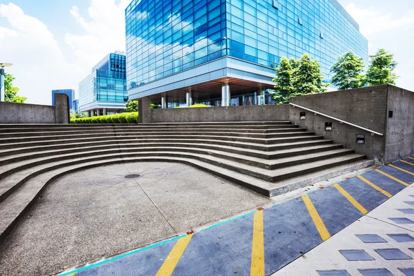 Skyline and buildings on ground with steps — Stock Photo, Image